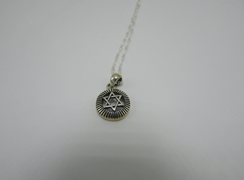 Small sterling silver Star of David in circular design
